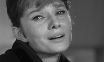 Movie still from “The Children's Hour” (1961), directed by William Wyler – A person with a tear in her eye; Close Up shot, Low angle