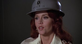 Movie still from “The China Syndrome” (1979), directed by James Bridges – A person wearing a helmet; Close Up shot, Over the shoulder angle