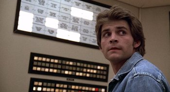 Movie still from “The China Syndrome” (1979), directed by James Bridges – A person in front of a wall; Close Up shot, Low angle