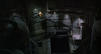 Movie still from “The China Syndrome” (1979), directed by James Bridges – An overhead view of a staircase in a building; Extreme Wide shot, Overhead angle