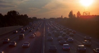 Movie still from “The China Syndrome” (1979), directed by James Bridges – A bunch of cars that are on a freeway; Extreme Wide shot, High angle