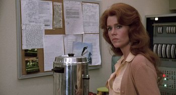Movie still from “The China Syndrome” (1979), directed by James Bridges – A woman standing in front of a coffee pot; Close Up shot, Over the shoulder angle
