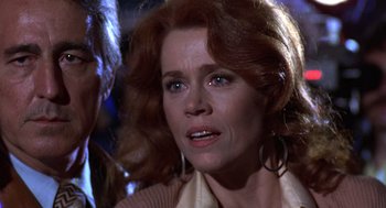 Movie still from “The China Syndrome” (1979), directed by James Bridges – A person with long red hair; Close Up shot, Over the shoulder angle