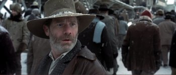 Movie still from “The Claim” (2000), directed by Michael Winterbottom – A person wearing a hat; Close Up shot, Low angle