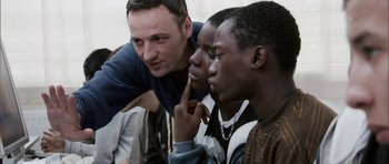 Movie still from “The Class” (2008), directed by Laurent Cantet – A group of young men standing next to each other; Close Up shot, Over the shoulder angle