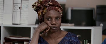Movie still from “The Class” (2008), directed by Laurent Cantet – A person wearing a head scarf; Close Up shot, Over the shoulder angle