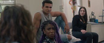 Movie still from “The Class” (2022), directed by Nicholas Celozzi – A man and a woman sitting next to each other; Close Up shot, Over the shoulder angle