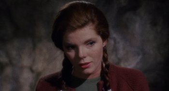 Movie still from “The Collector” (1965), directed by William Wyler – A person wearing a jacket; Close Up shot, High angle