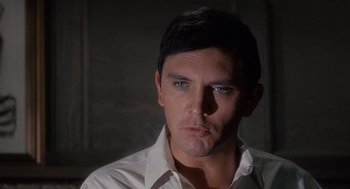 Movie still from “The Collector” (1965), directed by William Wyler – A person wearing a white shirt; Close Up shot, High angle