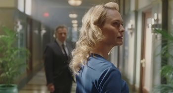 Movie still from “The Congress” (2013), directed by Ari Folman – A man and a woman standing in a hallway; Close Up shot, Low angle