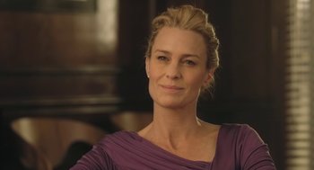 Movie still from “The Congress” (2013), directed by Ari Folman – A person wearing a purple dress; Close Up shot, Over the shoulder angle