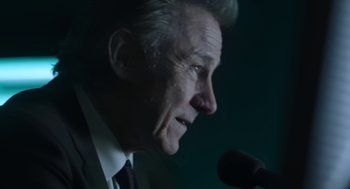 Movie still from “The Congress” (2013), directed by Ari Folman – An older man is speaking into a microphone; Close Up shot, Low angle