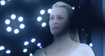 Movie still from “The Congress” (2013), directed by Ari Folman – A woman with blond hair and blue eyes looking at the camera; Close Up shot, Low angle