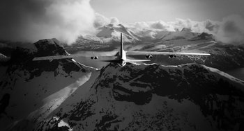 Movie still from “The Congress” (2013), directed by Ari Folman – An airplane is flying over a snowy mountain; Extreme Wide shot, Low angle