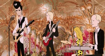 Movie still from “The Congress” (2013), directed by Ari Folman – A group of people that are standing in a room; Wide shot, Over the shoulder angle