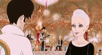 Movie still from “The Congress” (2013), directed by Ari Folman – A group of people sitting in a room with musical instruments; Medium shot, Over the shoulder angle