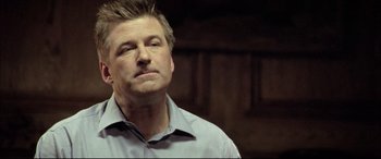 Movie still from “The Cooler” (2003), directed by Wayne Kramer – A person wearing a blue shirt; Close Up shot, Low angle