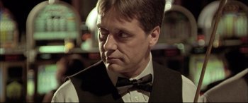 Movie still from “The Cooler” (2003), directed by Wayne Kramer – A person wearing a bow tie; Close Up shot, Over the shoulder angle