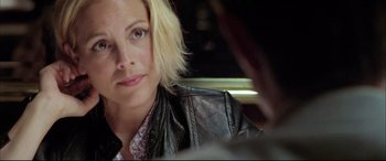 Movie still from “The Cooler” (2003), directed by Wayne Kramer – A person wearing a leather jacket; Close Up shot, Over the shoulder angle