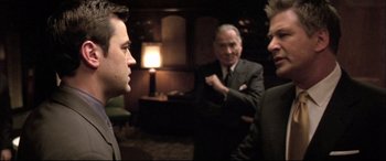 Movie still from “The Cooler” (2003), directed by Wayne Kramer – A group of men standing next to each other in a room; Medium shot, Over the shoulder angle