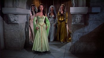 Movie still from “The Court Jester” (1955), directed by Melvin Frank – A group of women dressed in medieval clothing; Wide shot, Low angle