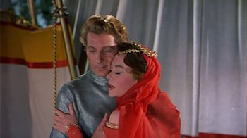 Movie still from “The Court Jester” (1955), directed by Melvin Frank – A man and a woman dressed in medieval garb; Medium shot, Low angle