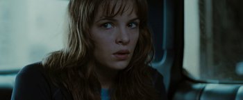 Movie still from “The Crazies” (2010), directed by Breck Eisner – A person with long brown hair; Close Up shot, Low angle