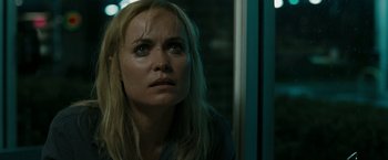 Movie still from “The Crazies” (2010), directed by Breck Eisner – A person with long blonde hair; Close Up shot, Over the shoulder angle