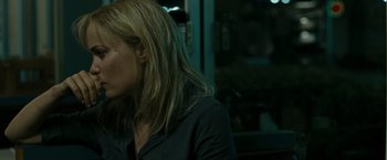 Movie still from “The Crazies” (2010), directed by Breck Eisner – A person with long blonde hair; Close Up shot, Over the shoulder angle