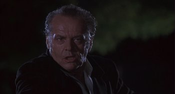 Movie still from “The Crossing Guard” (1995), directed by Sean Penn – An older man with a cigarette in his mouth; Close Up shot, Low angle