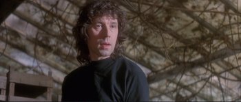 Movie still from “The Crying Game” (1992), directed by Neil Jordan – A person with long hair; Close Up shot, Low angle