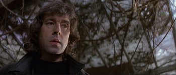 Movie still from “The Crying Game” (1992), directed by Neil Jordan – A person with long hair; Close Up shot, Low angle