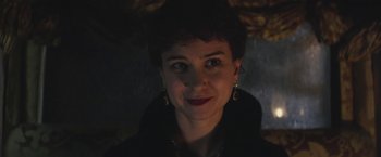 Movie still from “The Current War: Director's Cut” (2017), directed by Alfonso Gomez-Rejon – A person wearing a black jacket; Close Up shot, Over the shoulder angle