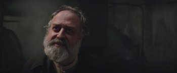 Movie still from “The Current War: Director's Cut” (2017), directed by Alfonso Gomez-Rejon – An older man with a beard and a mustache; Close Up shot, Low angle