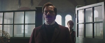 Movie still from “The Current War: Director's Cut” (2017), directed by Alfonso Gomez-Rejon – A man and a woman standing next to each other in a room; Close Up shot, Low angle