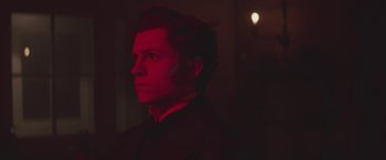 Movie still from “The Current War: Director's Cut” (2017), directed by Alfonso Gomez-Rejon – A man in a dark room looking up at the ceiling; Close Up shot, Low angle