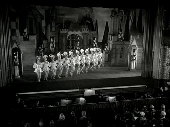 Movie still from “The Dam Busters” (1955), directed by Michael Anderson – A black and white photo of a scene from a show; Extreme Wide shot, Low angle