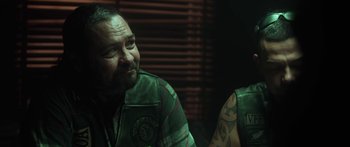 Movie still from “The Dark Horse” (2014), directed by James Napier Robertson – A person sitting in front of another person; Close Up shot, Over the shoulder angle