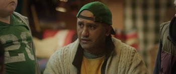 Movie still from “The Dark Horse” (2014), directed by James Napier Robertson – A person wearing a hat; Close Up shot, Over the shoulder angle