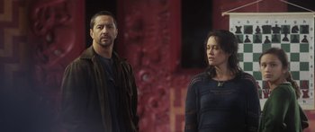 Movie still from “The Dark Horse” (2014), directed by James Napier Robertson – A man and a woman standing next to each other; Medium shot, Over the shoulder angle