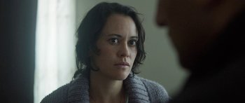 Movie still from “The Dark Horse” (2014), directed by James Napier Robertson – A person sitting in front of a window; Close Up shot, Over the shoulder angle