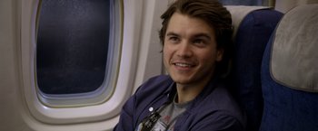 Movie still from “The Darkest Hour” (2011), directed by Chris Gorak – A man sitting on top of an airplane looking at the camera; Close Up shot, Over the shoulder angle