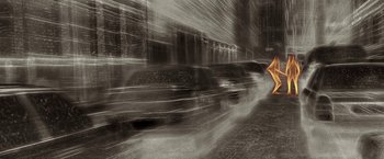 Movie still from “The Darkest Hour” (2011), directed by Chris Gorak – A car driving down a street next to a building; Extreme Wide shot, High angle