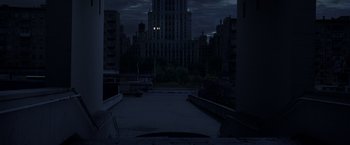 Movie still from “The Darkest Hour” (2011), directed by Chris Gorak – A view of a city at night from a parking lot; Extreme Wide shot, Low angle