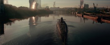 Movie still from “The Darkest Hour” (2011), directed by Chris Gorak – A boat floating on top of a body of water; Extreme Wide shot, High angle