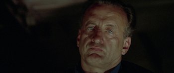 Movie still from “The Day of the Dolphin” (1973), directed by Mike Nichols – A person looking up at the sky; Close Up shot, Low angle