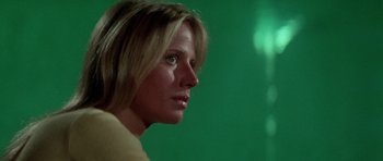 Movie still from “The Day of the Dolphin” (1973), directed by Mike Nichols – A person with a green screen in the background; Close Up shot, Low angle