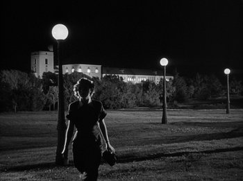 Movie still from “The Day the Earth Stood Still” (1951), directed by Robert Wise – A woman walking in a field at night; Wide shot, Low angle