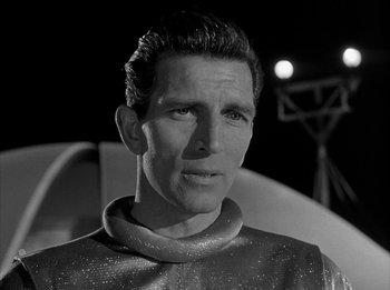 Movie still from “The Day the Earth Stood Still” (1951), directed by Robert Wise – Black and white photograph of a man wearing a space suit; Close Up shot, Low angle
