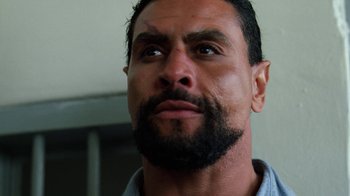 Movie still from “The Dead Pool” (1988), directed by Buddy Van Horn – A person with a beard; Close Up shot, Low angle